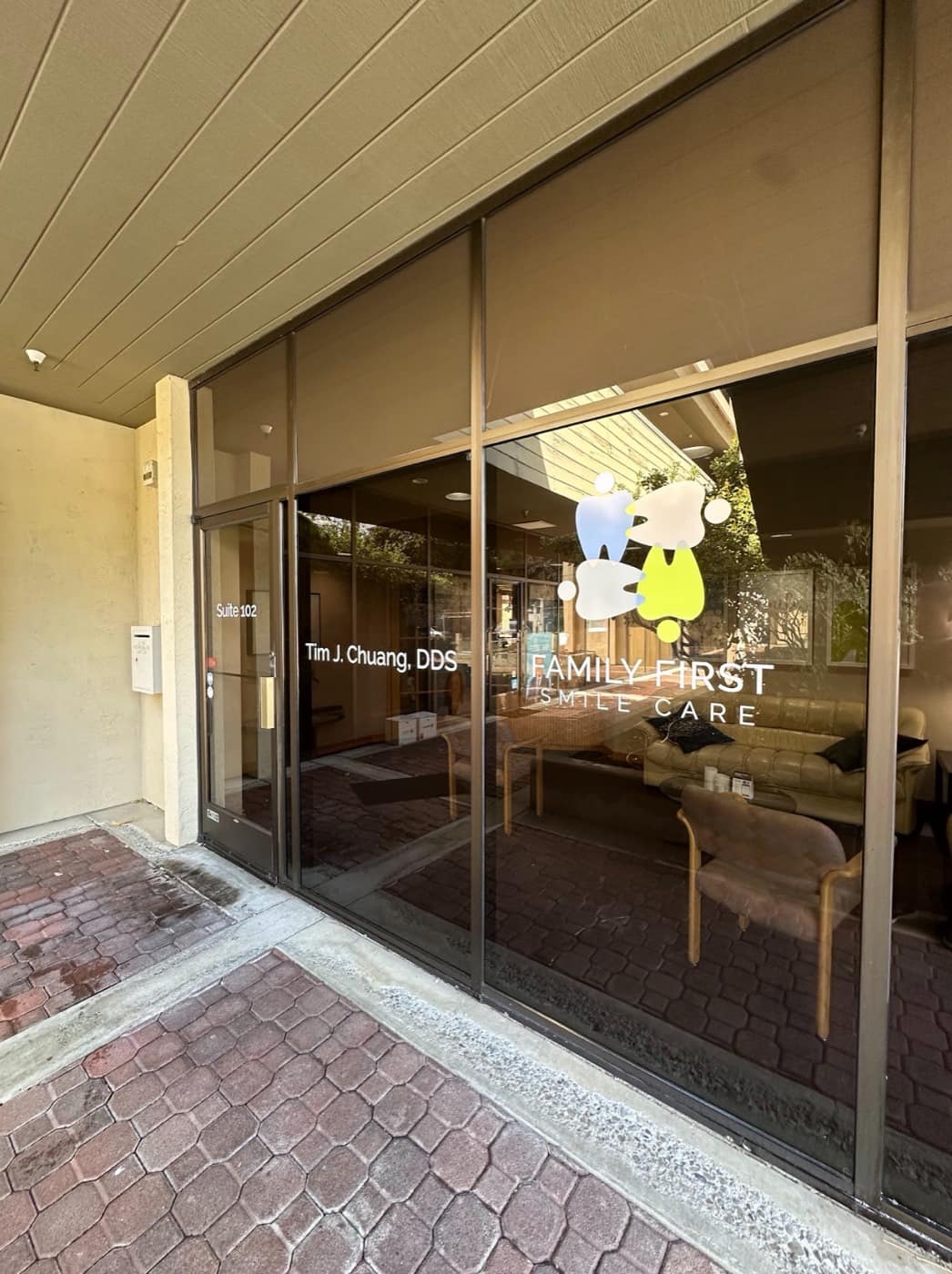The Family First Smile Care storefront at Suite 102